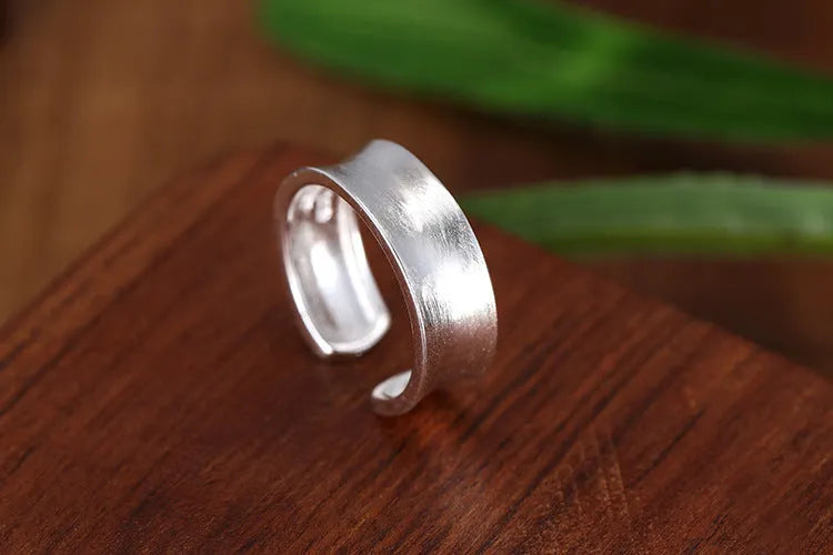 Geometric adjustable opening sterling silver ring with frosted finish and electroplated silver colour