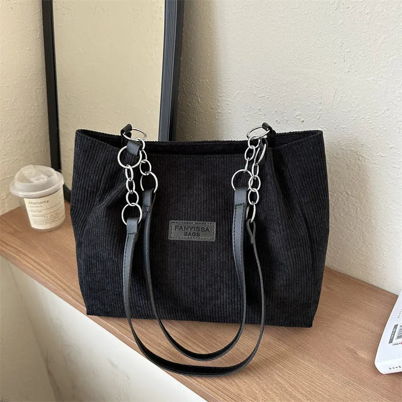 Corduroy one-shoulder tote handbag in horizontal square shape with three-dimensional pocket