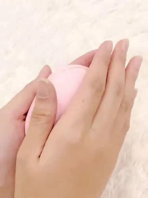 Compact USB hand warmer in pebble shape with single side heating, available in pink blue green beige colours
