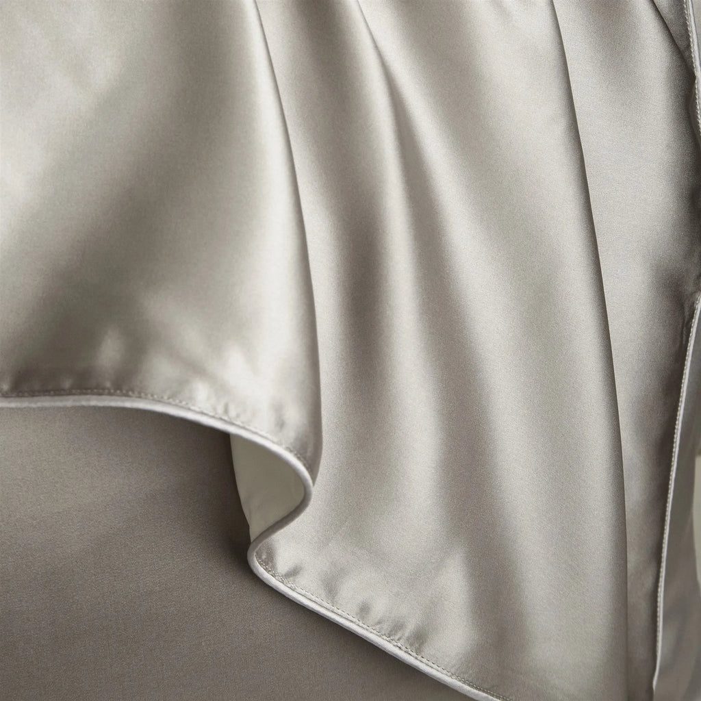 Single mulberry silk pillowcase in palace luxury style, shown in a selection of available colours.
