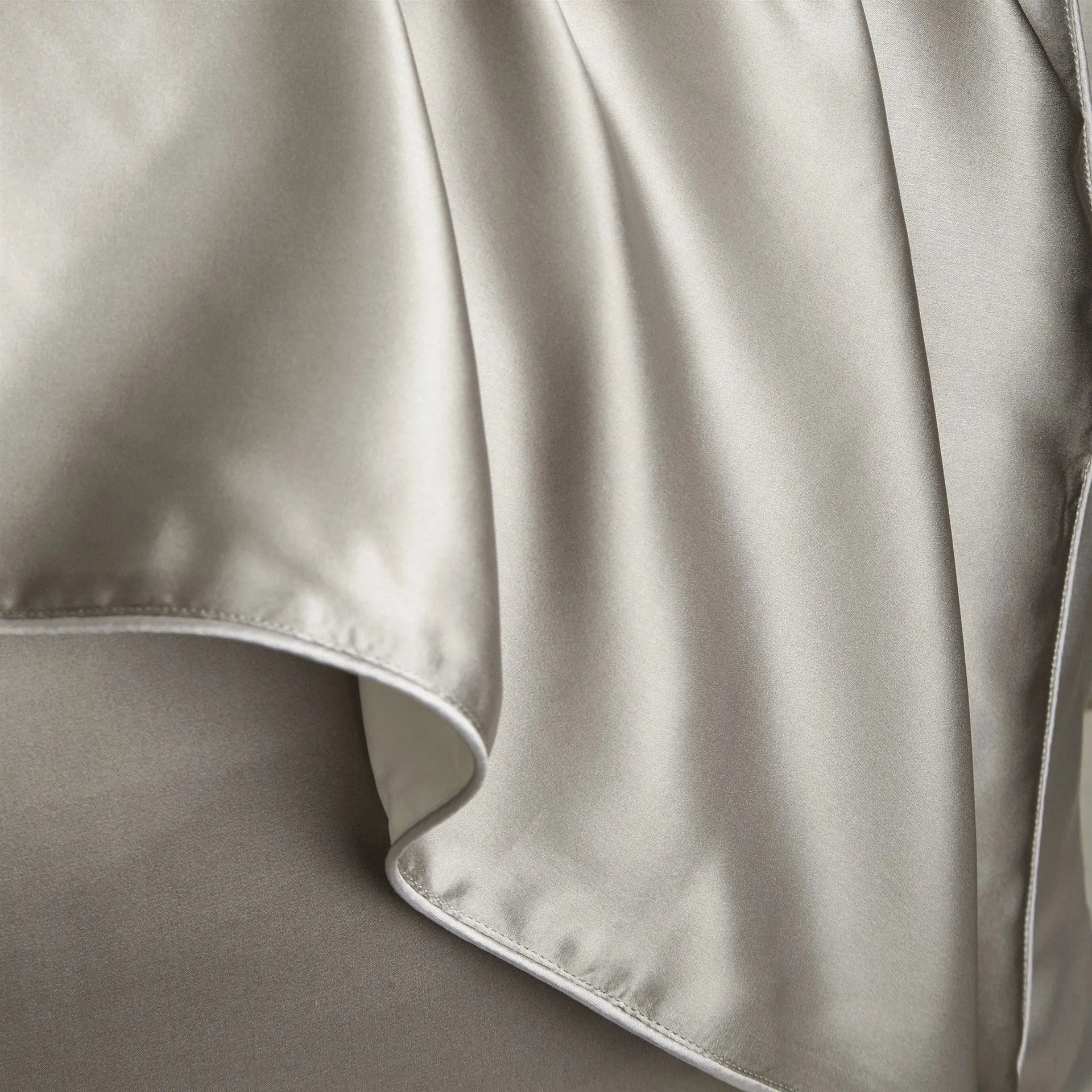 Single mulberry silk pillowcase in palace luxury style, shown in a selection of available colours.