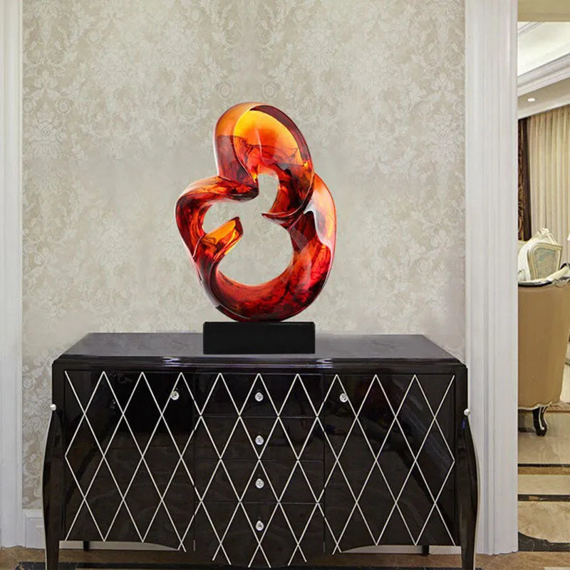 Transparent resin craft ornament in modern design available in orange red or blue colour