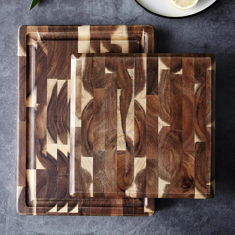 Brown acacia solid wood chopping board with parquet design, 3cm thick, on a kitchen counter
