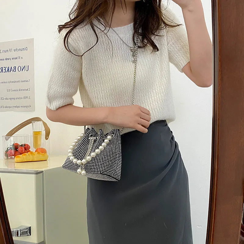 PU leather crossbody bag with diamond accents, chain strap, and bucket shape in colour option