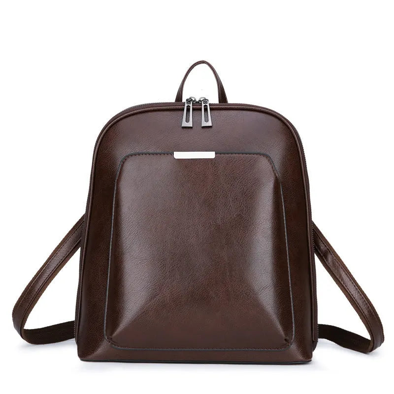 Women's fashion PU backpack in Black with shoulder strap and fabric lining, front view