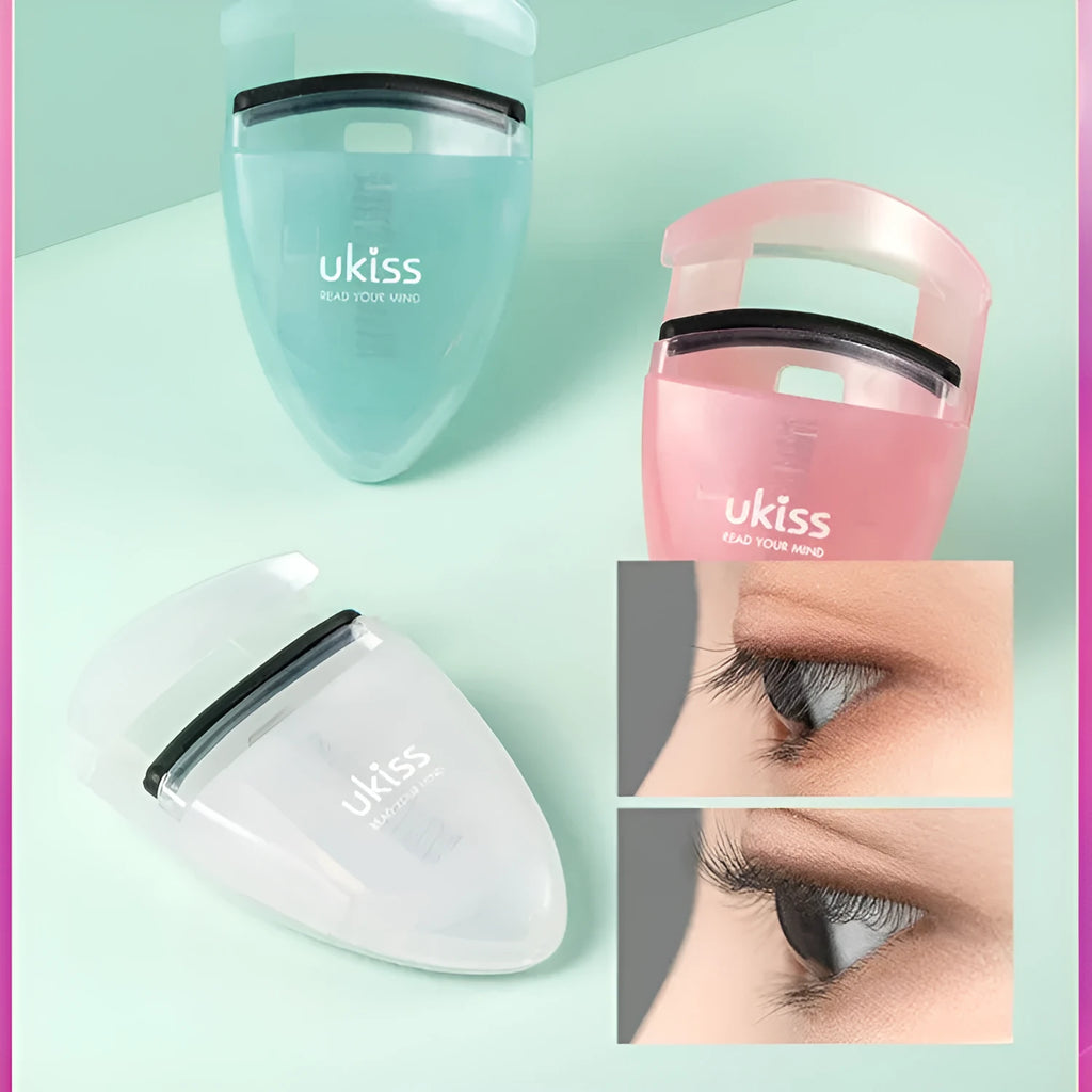 Mini portable eyelash curler in white with silicone pad and stainless steel arm
