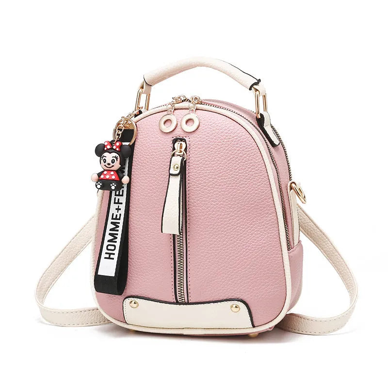 Fashion backpack for women in PU leather oval shape with double shoulder straps and car suture detail