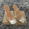 Women's high heel fashion boot in black and silver colour options on a white background.