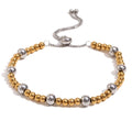 Gold electroplated geometric jewellery set with earrings, bracelet and necklace on stainless steel