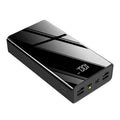 Red and black 40000mAh power bank with LCD display showing battery level.