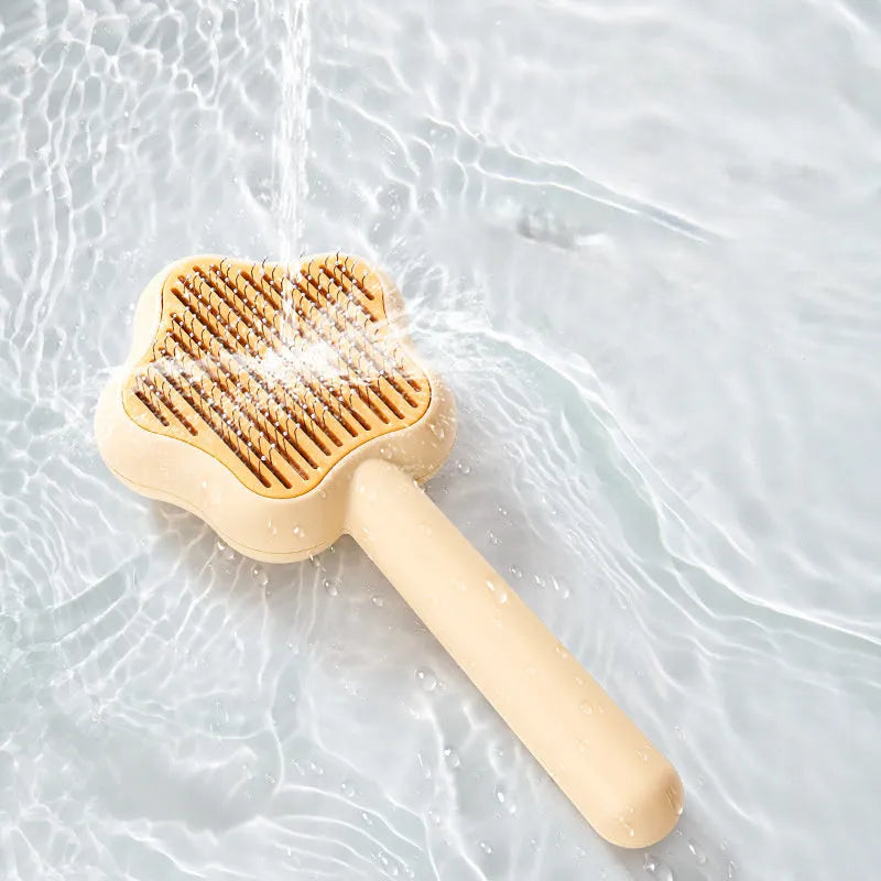 Self-cleaning cat comb with stainless steel needles, green colour, 20cm long pet grooming tool