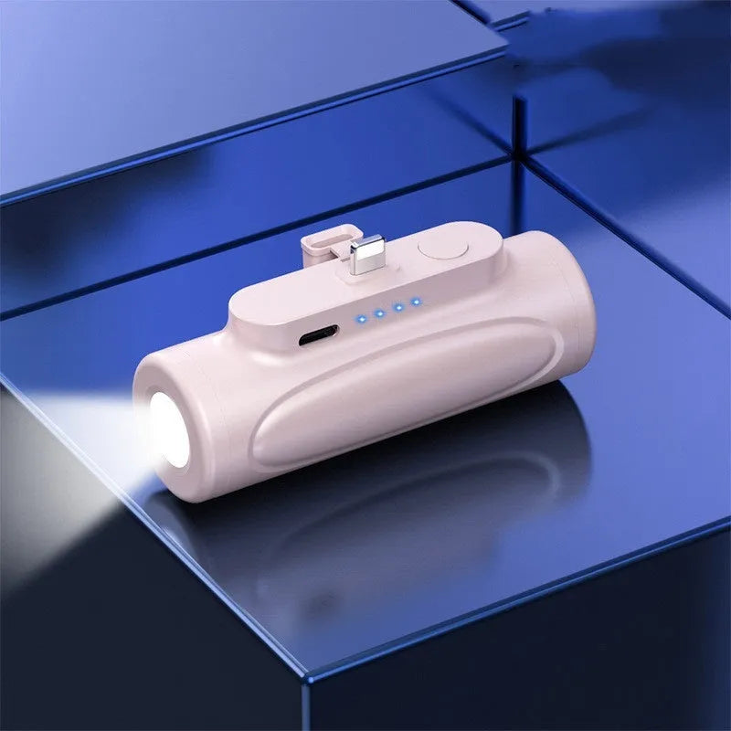 Black or pink power bank with integrated LED flashlight, 5000mAh capacity, 83mm length