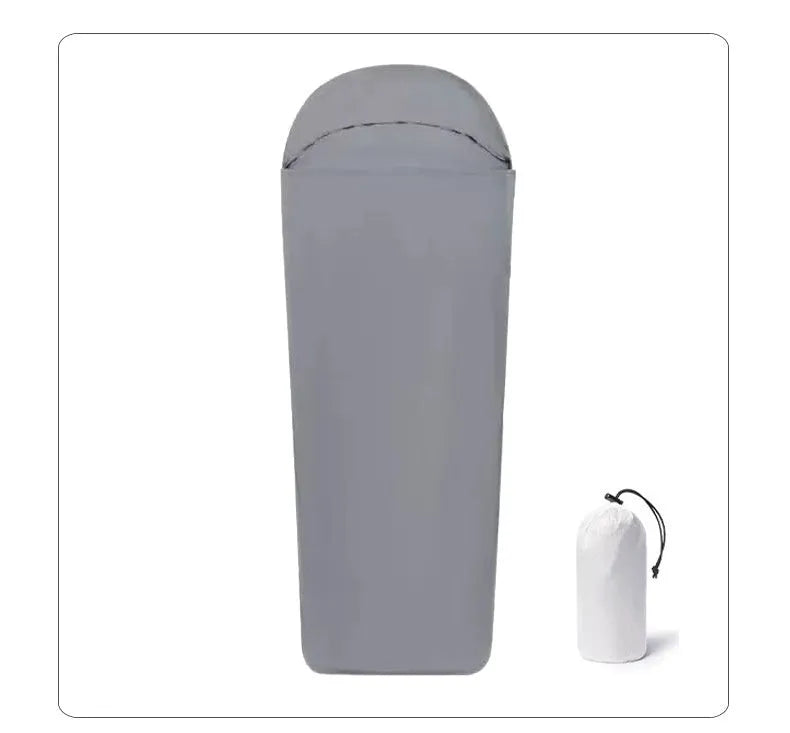Blue nylon mummy camping sleeping bag showing tapered design and matt nylon fabric texture