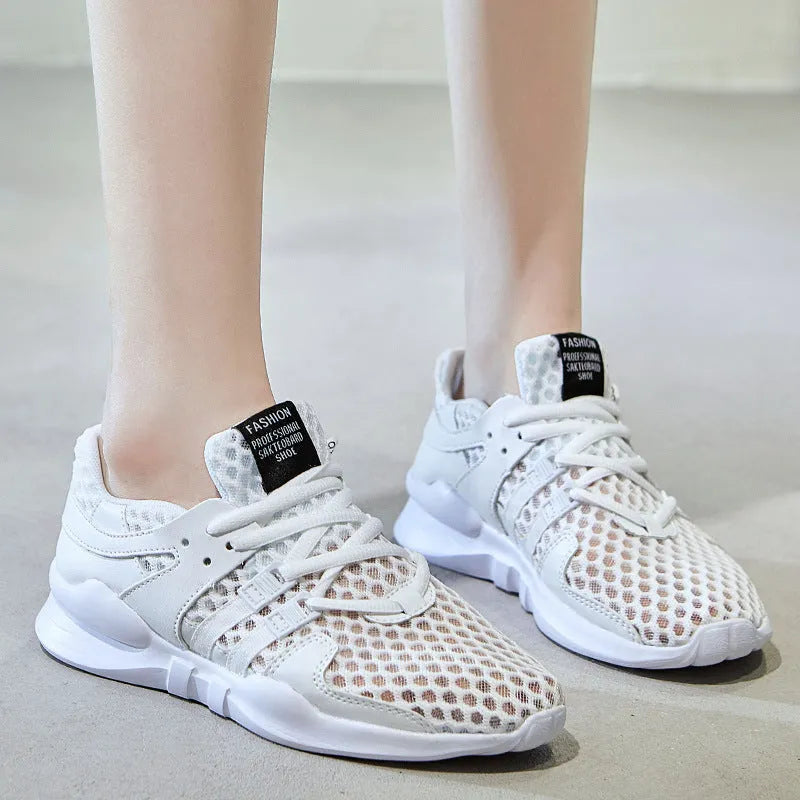 Casual mesh sneakers with hollow-out breathable design and round toe in black and white colour options