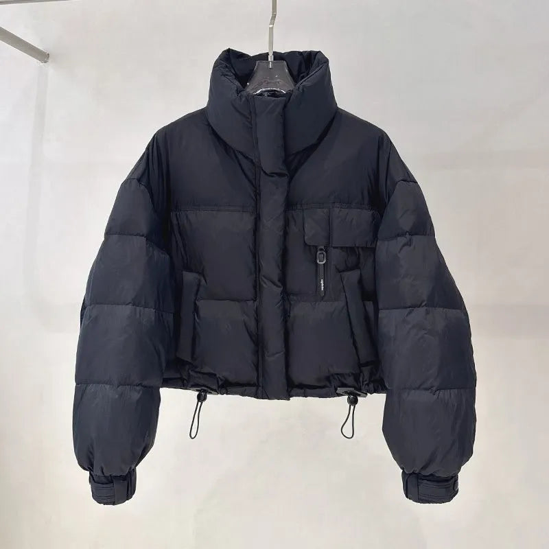 Korean-style stand collar short puffer jacket in solid colour with pleats and princess sleeves, available in yellow, black, raspberry red, and blue