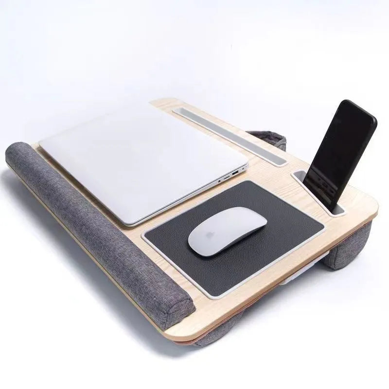 Foldable laptop bed desk with black walnut finish, open and ready for use on a bed