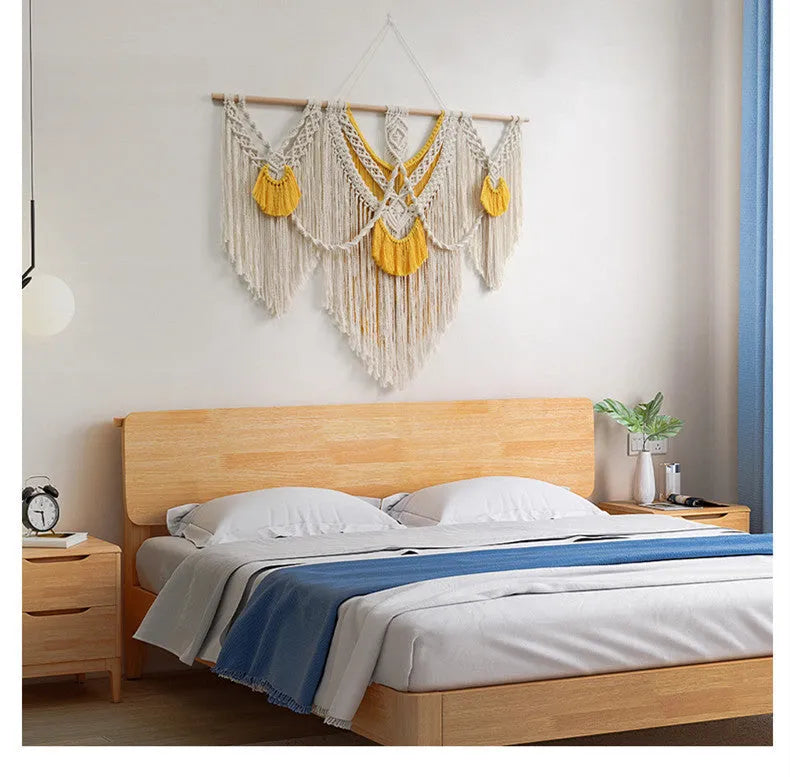 Hand-woven cotton Nordic tapestry wall hanging with creamy white and yellow colours