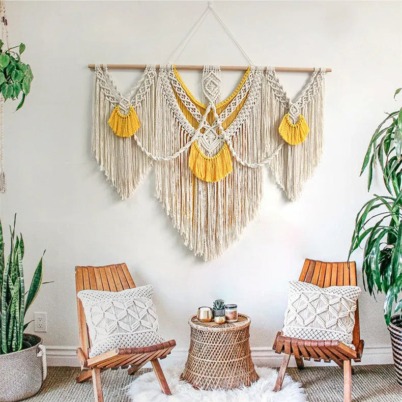 Hand-woven cotton Nordic tapestry wall hanging with creamy white and yellow colours