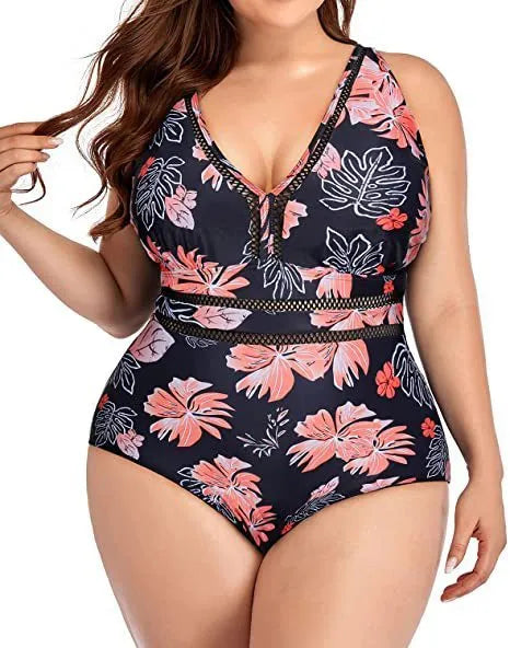 Women's black printed polyester plus-size bikini swimsuit shown on a hanger.