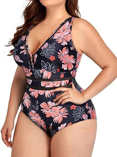 Women's black printed polyester plus-size bikini swimsuit shown on a hanger.