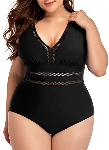 Women's black printed polyester plus-size bikini swimsuit shown on a hanger.