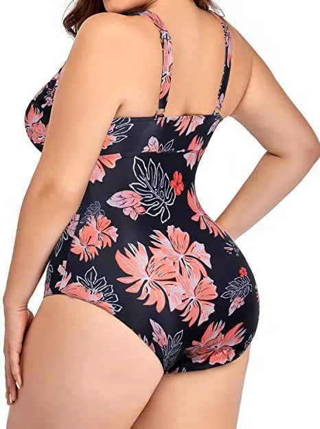 Women's black printed polyester plus-size bikini swimsuit shown on a hanger.