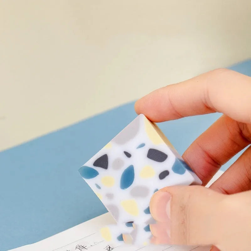 Super Clean Traceless brick-shaped rubber eraser for pencil marks.