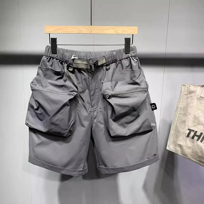 Men's black workwear shorts with pockets, loose fit, and straight leg hem