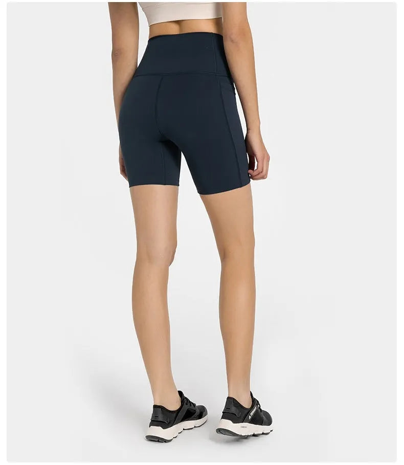 Women's short-length sports shorts in cotton blend fabric shown in black, for running and fitness activities.