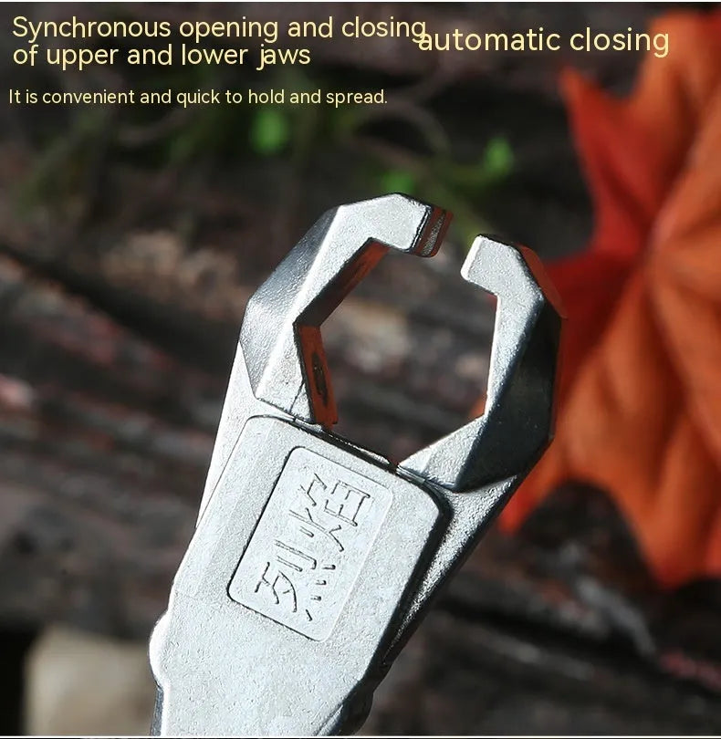 Zinc alloy archery release aid component with a two-axis harpoon clip isolated on a white background.
