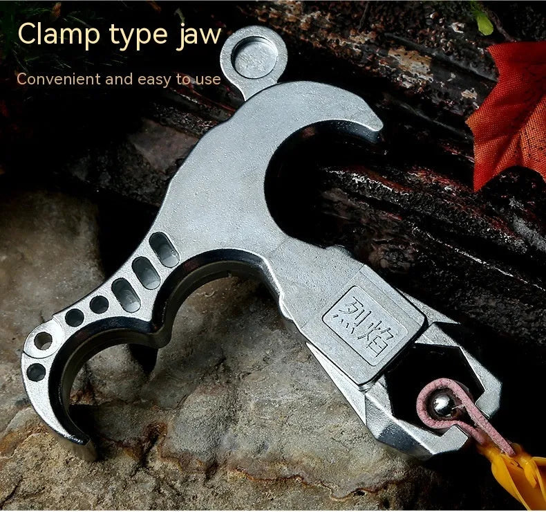 Zinc alloy archery release aid component with a two-axis harpoon clip isolated on a white background.