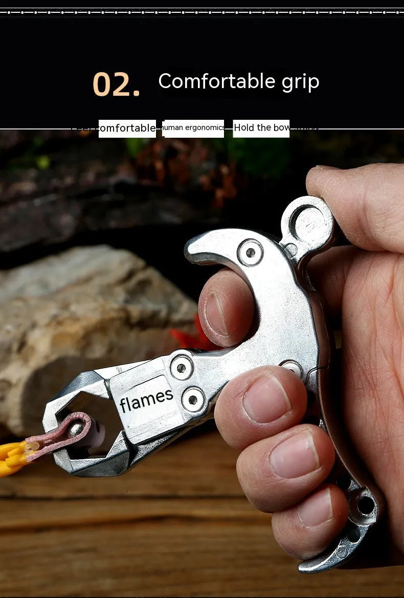 Zinc alloy archery release aid component with a two-axis harpoon clip isolated on a white background.