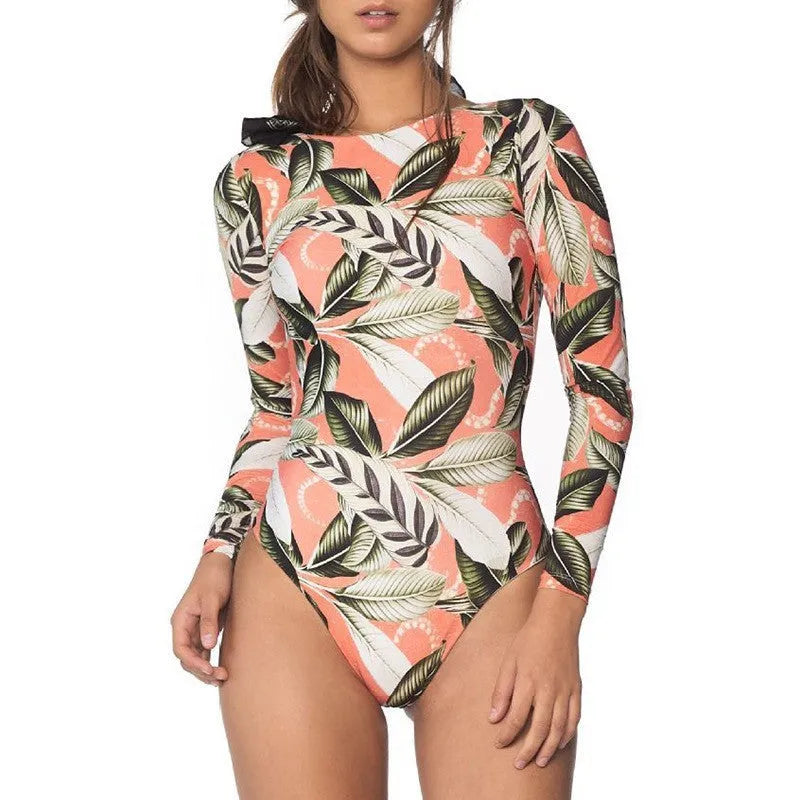 Women's floral leaf print backless one-piece swimsuit on a mannequin.