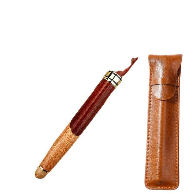 Metal ballpoint pen with wooden colour finish and black bag on white background