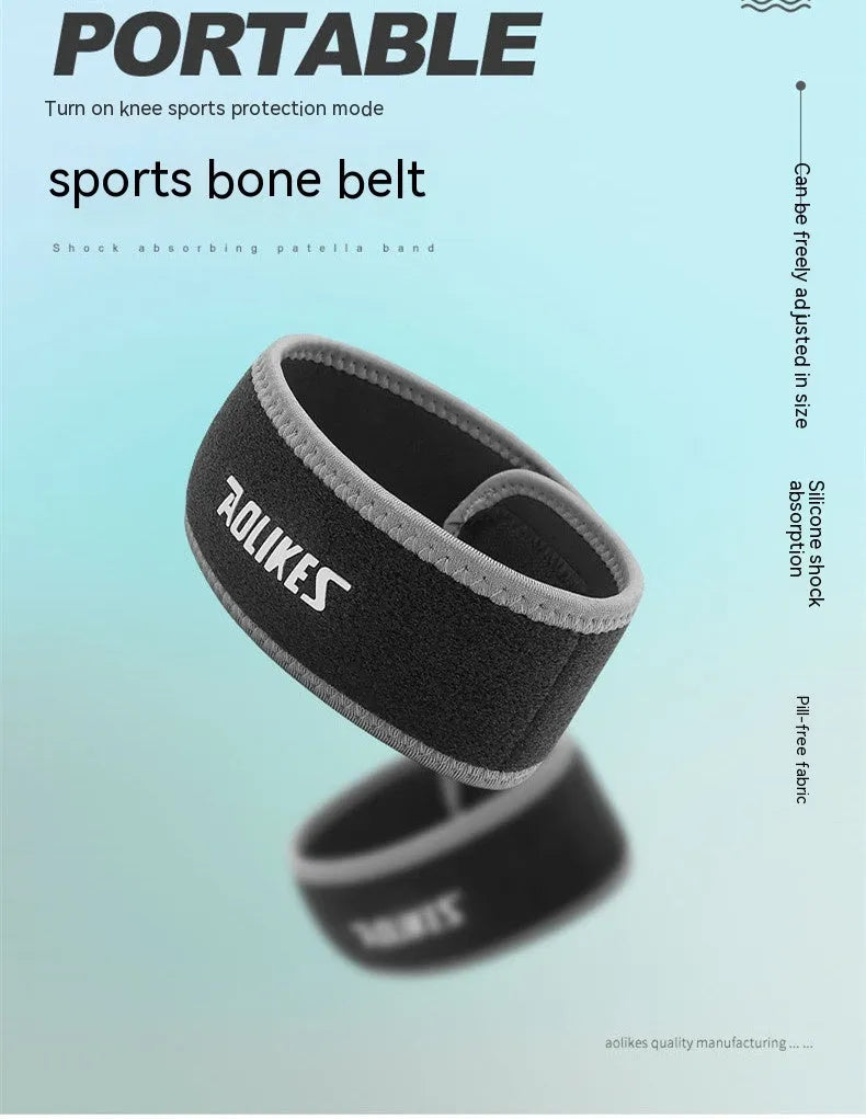 Black and grey adult patella retinaculum knee pad for sports protection.