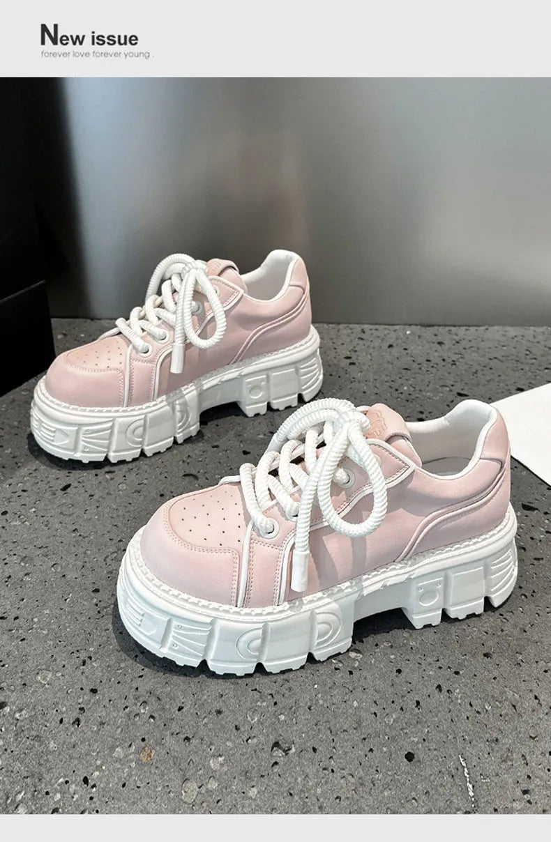 Women's beige casual leather shoes with a spring muffin heel on a rubber foam sole.