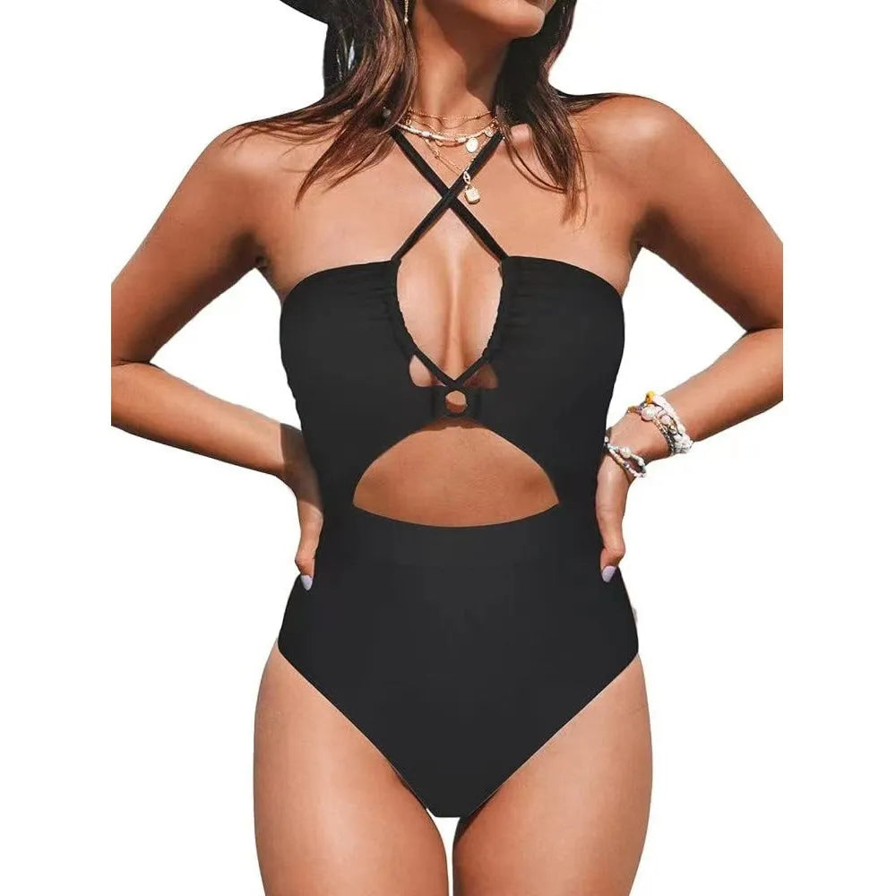 Women's solid colour backless one-piece swimsuit in polyester spandex blend on a mannequin.