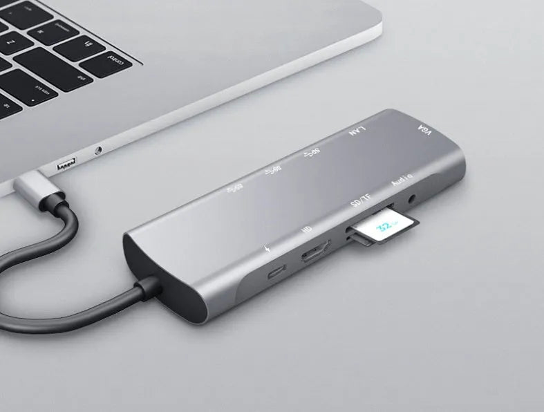 Grey aluminium USB-C docking station with HDMI, VGA and USB ports
