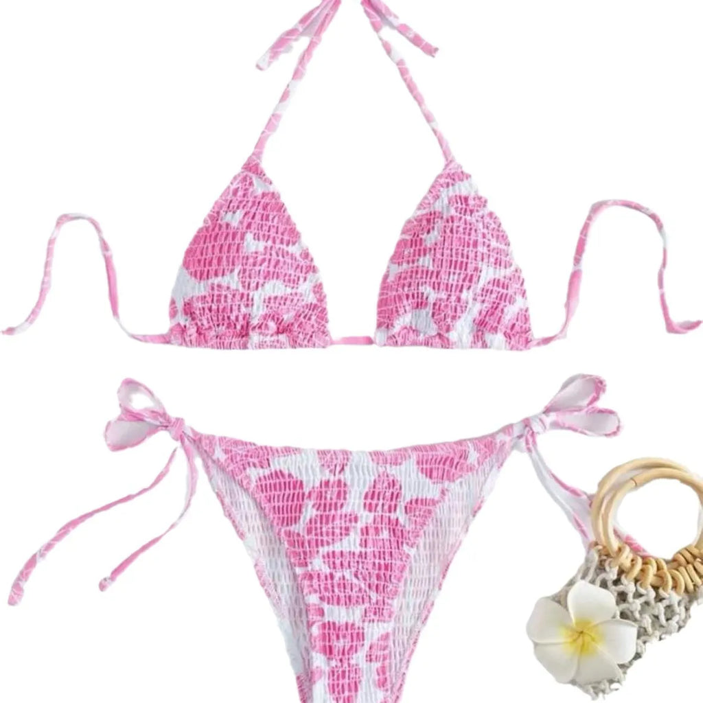 Women's floral halter neck two-piece swimsuit in briefs style, shown in light blue colour.