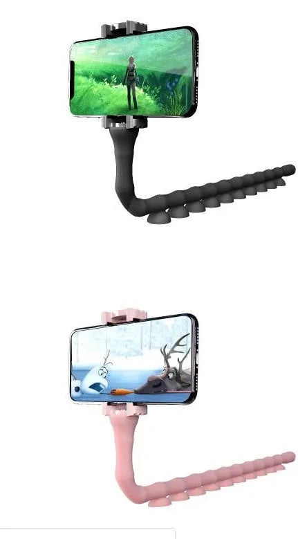 Flexible rubber phone holder with suction cup mounted on a surface showing 360-degree rotation capability
