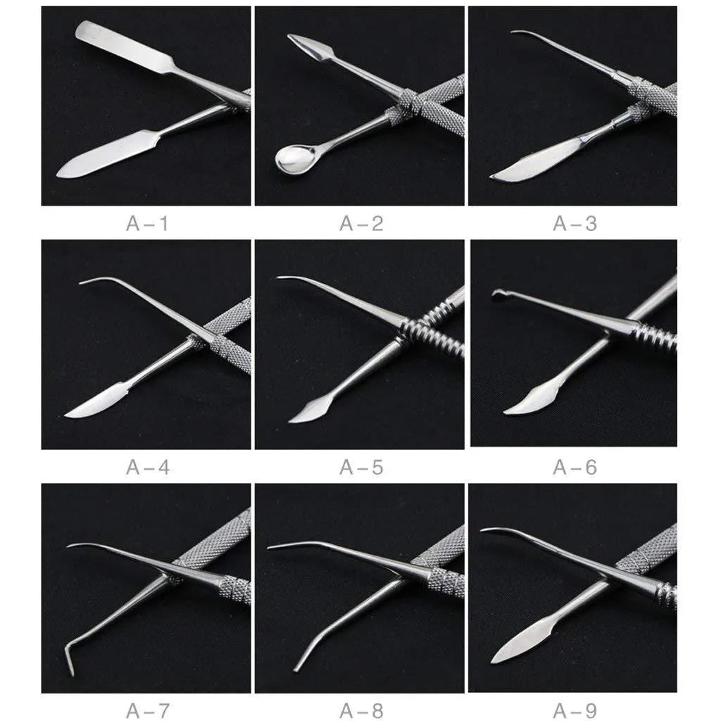 Ten stainless steel clay knives with photo colour handles arranged on a surface for pottery sculpting work.