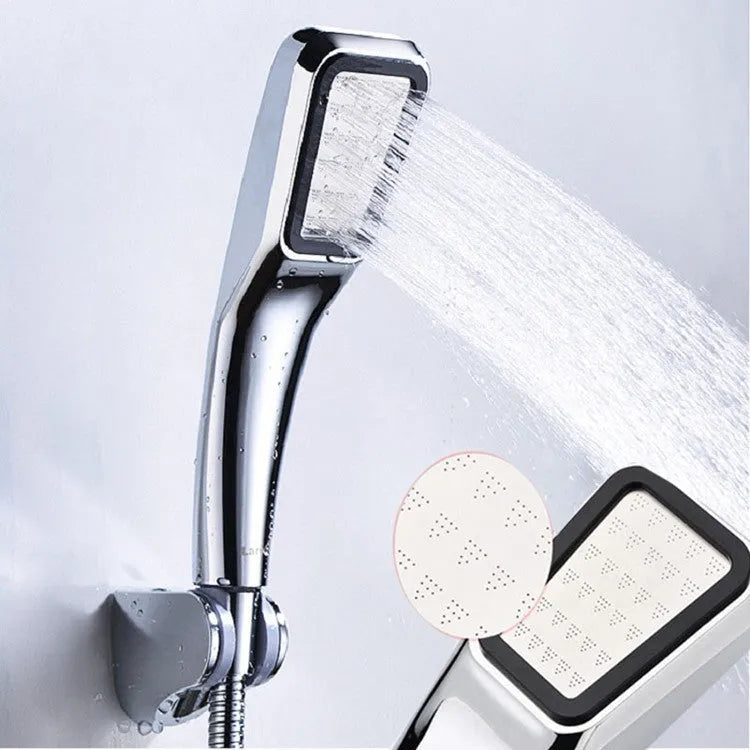 Orange hand-held shower head with hose for rain shower function