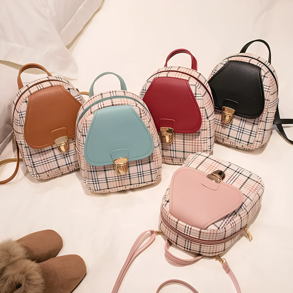 A black PU one shoulder diagonal phone bag worn crossbody, also shown held in hand.