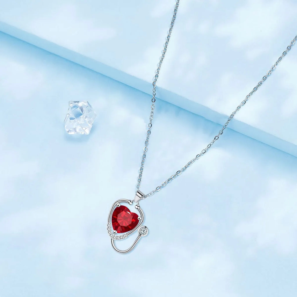 Women's copper stethoscope necklace with Red Diamond electroplated finish, medical-inspired pendant design