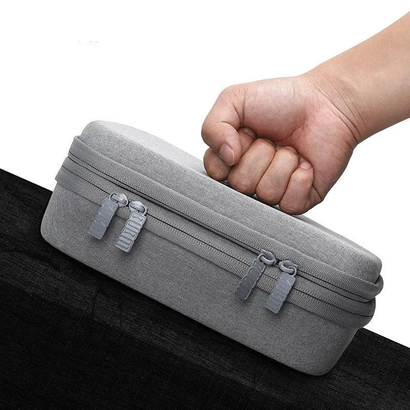 Black EVA digital storage bag for headphones and small electronics with organised compartments