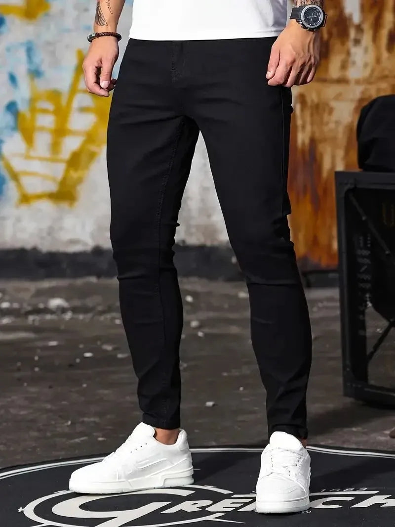 Men's retro washing stretch slim fit jeans in blue, front view, five-quarter length