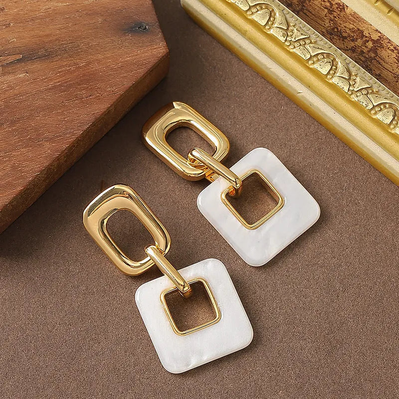 Copper geometric square earrings with hollow design and chamfered corners