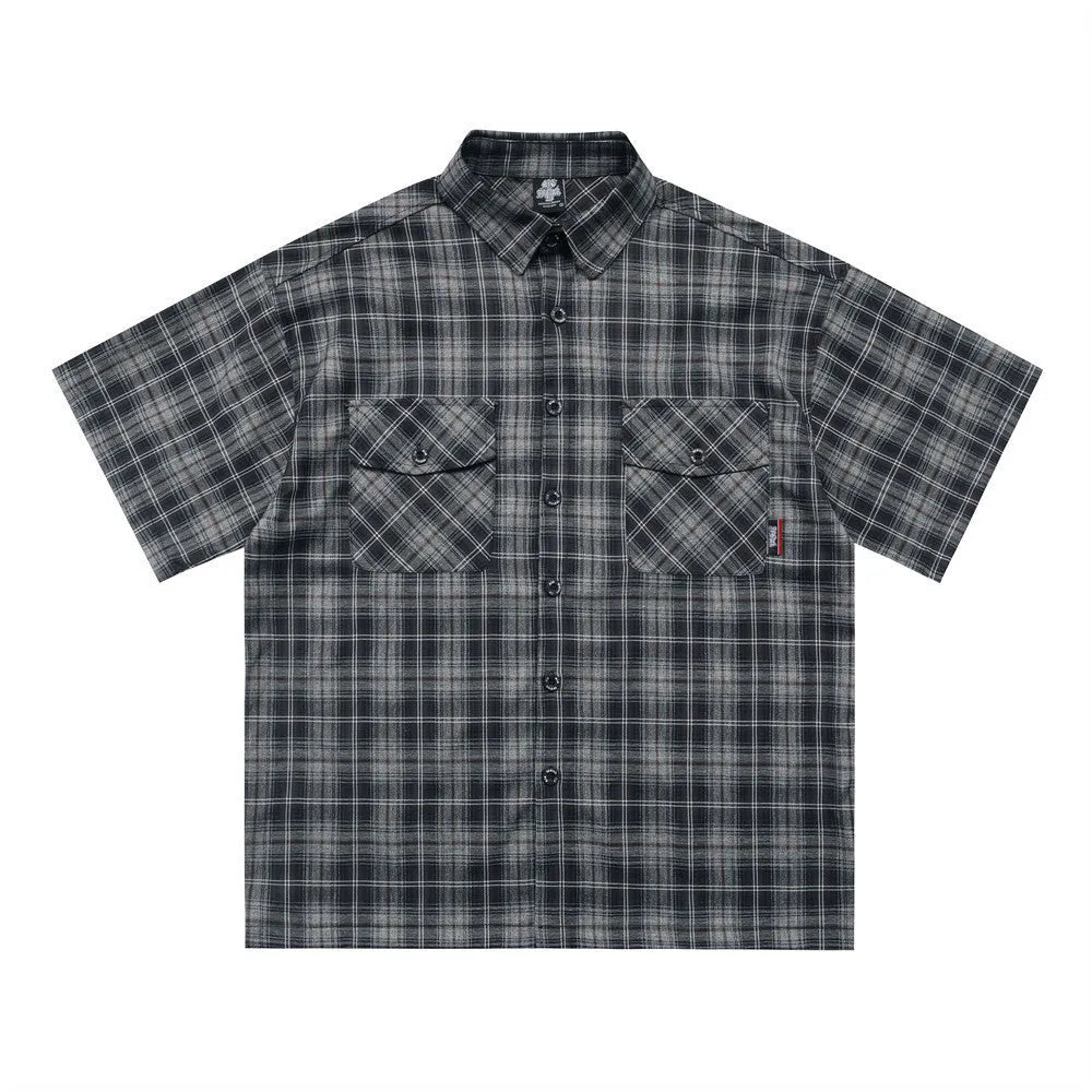 Men's black and brown plaid short sleeve shirt with embroidered lettering and lapel collar