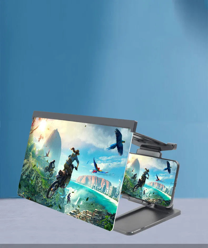 Black folding mobile phone screen amplifier with detachable holder on desktop