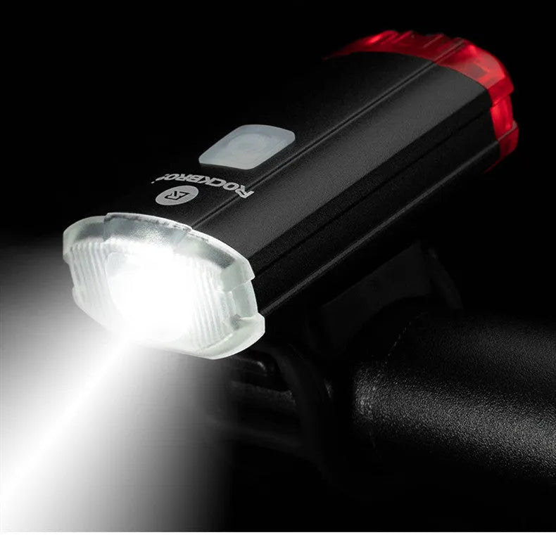 Black bicycle helmet light with aluminium alloy shell showing USB charging port and compact 6.3cm size